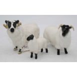 A Beswick figure of a black faced ram, model No.3071; together with a Beswick black faced sheep,