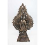 A gilt metal deity, height 41cm