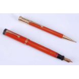 A Parker Duofold Red Senior fountain pen and pencil, the fountain barrel engraved 'GEO. S. PARKER