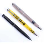 Two Pelikan M205 fountain pens, being a DUO yellow highlighter with logo and 'Pelikan BB' engraved