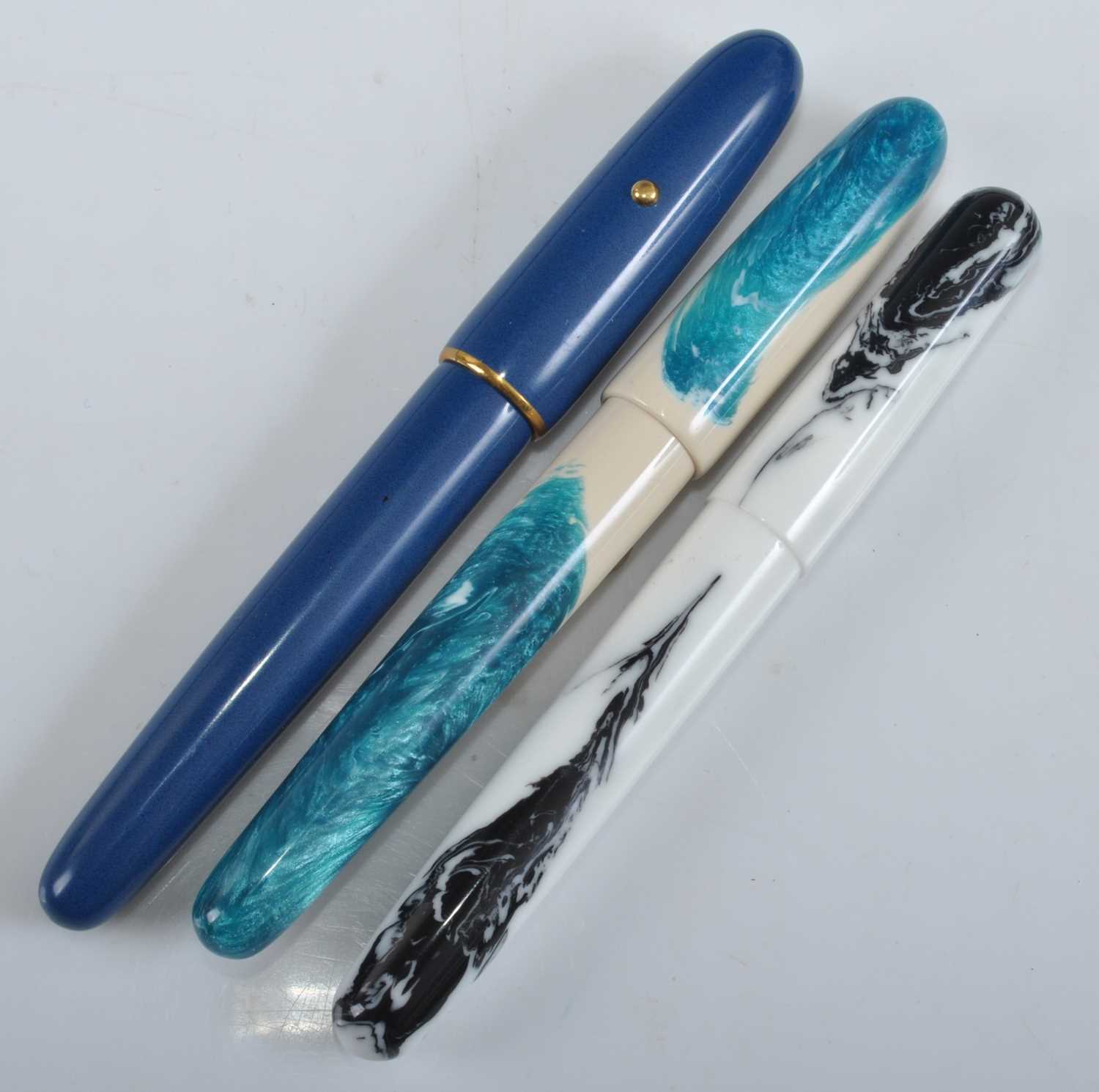 Three Clyde Pen Company fountain pens, being a Blue Torpedo with gold filled trim, Life's a Beach - Image 4 of 4