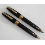 A Sheaffer PFM fountain pen, in black with 14k gold fittings, the cap engraved SHEAFFER'S MADE IN