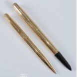 A cased Parker Signet / Insignia gold filled fountain pen and pencil set, the pen barrel engraved