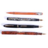 Four vintage pens, comprising a boxed Unique Pen Co Ltd fountain in silver and black striped mottled