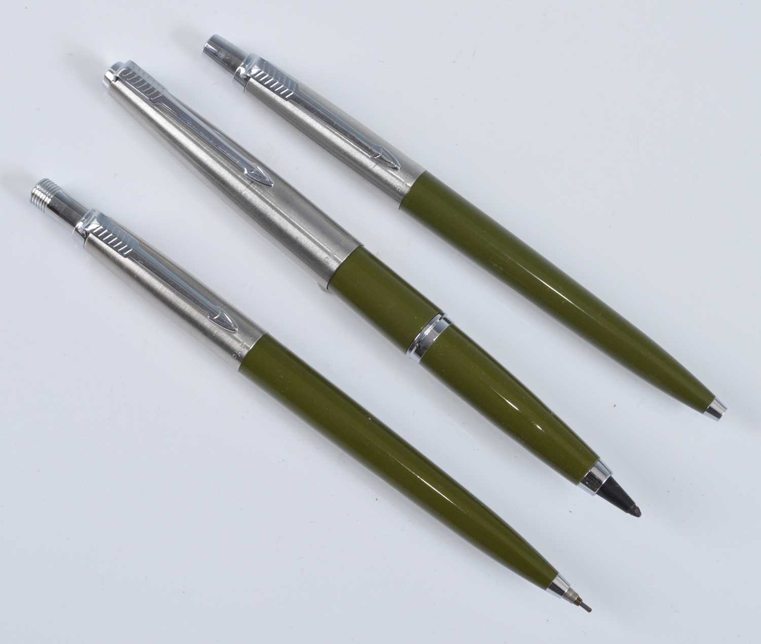 A boxed set of three Parker pens, comprising felt-tip, ballpoint and pencil, all in olive green with