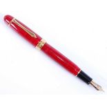 A Classic Pens LM1 limited edition Flame Red fountain pen, having gold plated clip, gold plated