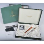 A Conway Stewart Churchill Red Ripple fountain pen, limited edition No.368/500, with gold trim,