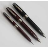 A Sheaffer PFM fountain pen, in burgundy with silver fittings and palladium silver nib, the lid