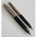 A Sheaffer Imperial fountain pen and mechanical pencil set, in black with bi-colour steel and gold