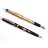 Two Japanese fountain pens by Platinum, one being a #3776 maki-e Golden Ryukyu Dragon design, gold