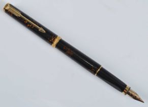 A Parker Premier Chinese Laque fountain pen, with gold trim, the nib engraved PARKER 750M 18K