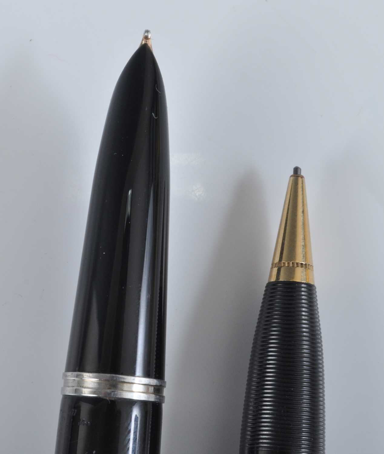 A Parker 51 fountain pen and pencil set, in black with gold trim, the pen barrel engraved PARKER " - Image 2 of 7