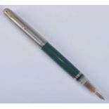 A Parker 51 double jewelled fountain pen, in Nassau Green with Lustraloy cap, having transparent
