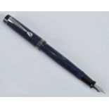 A cased Filcao Columbia fountain pen by Richard Binder, in deep blue resin with orange flecks and