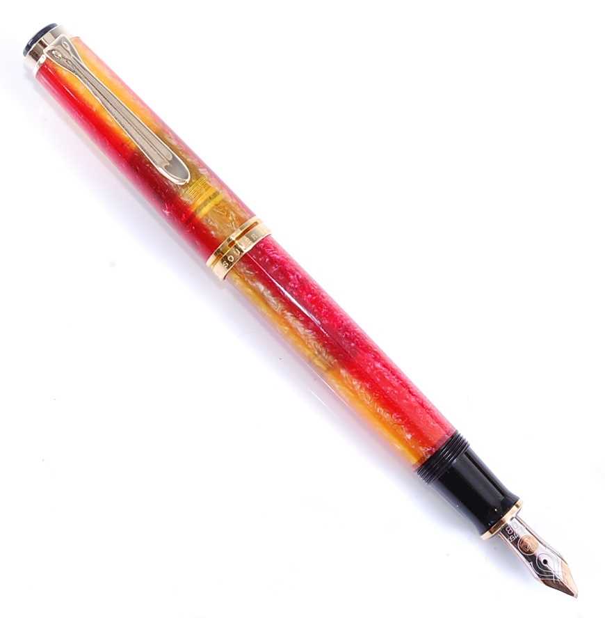 A Pelikan M620 City series 'Shanghai' fountain pen in yellow and red, having gold plated fittings