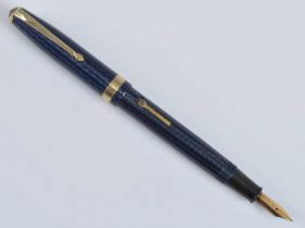 A Conway Stewart 76 fountain pen, in blue herringbone with gold trim, the barrel engraved Conway