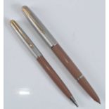 A Parker 51 fountain pen and pencil set, in Cocao with Lustraloy caps, the fountain pen barrel