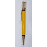 A Parker Duofold Mandarin pencil, in Mandarin yellow with black bands and gold plated fittings,