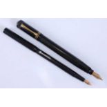 Two Ford fountain pens, being a Ford's Patent Pen in black with gold plated fittings, the barrel