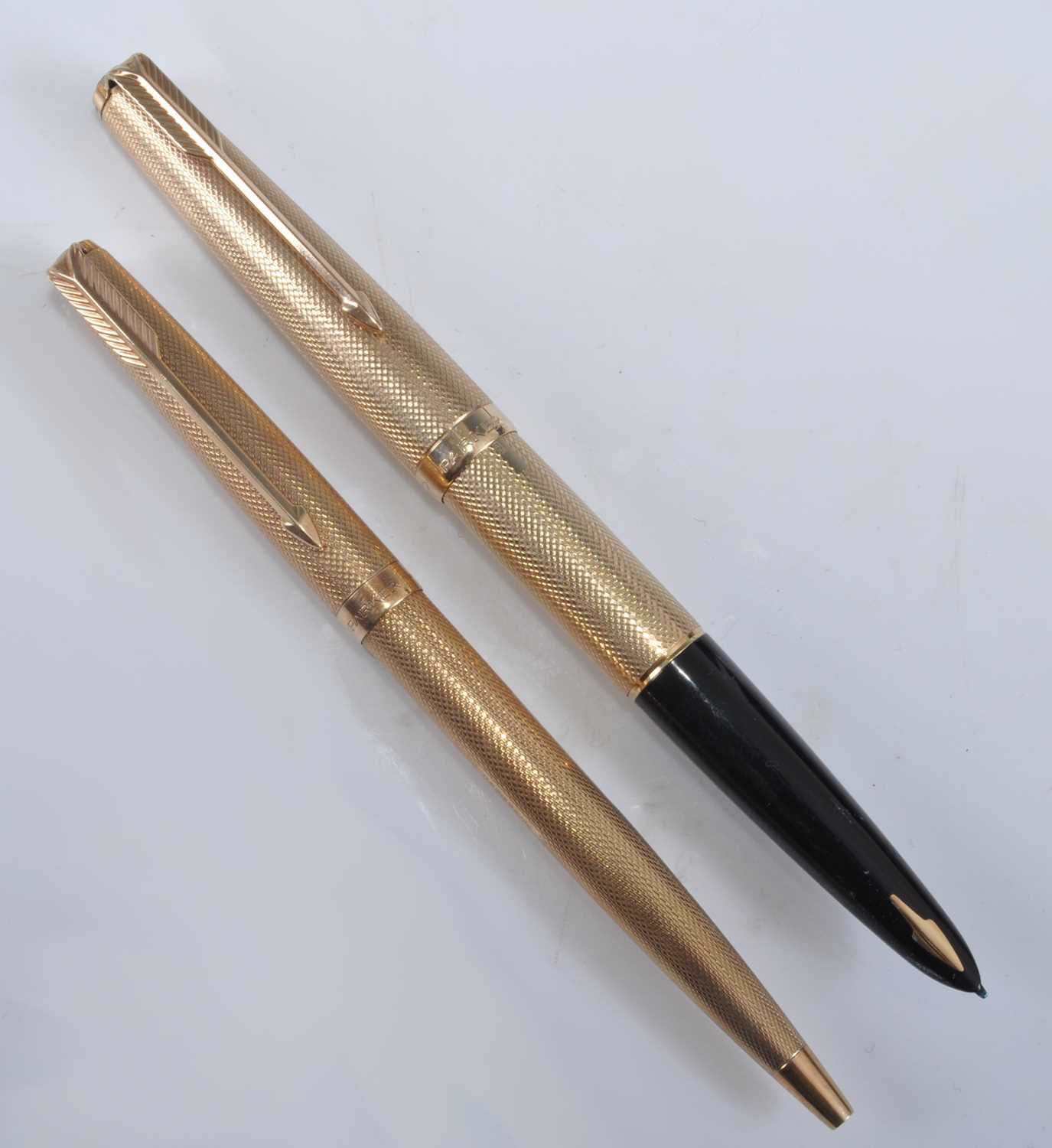 A Parker 61 Presidential double-jewelled fountain pen and ballpoint pen, in the Gold Barley pattern,