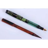 A Rufford for Boots the Chemist fountain pen in mottled green with semi-translucent barrel and