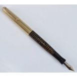 A Parker Vacuumatic Imperial Golden Pearl fountain pen with gold cap, the barrel engraved GEO. S.