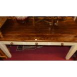 A contemporary stained and painted pine farmhouse kitchen table, having three opposing side drawers,