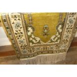 A small Persian green silk ground prayer rug, 75 x 52cm