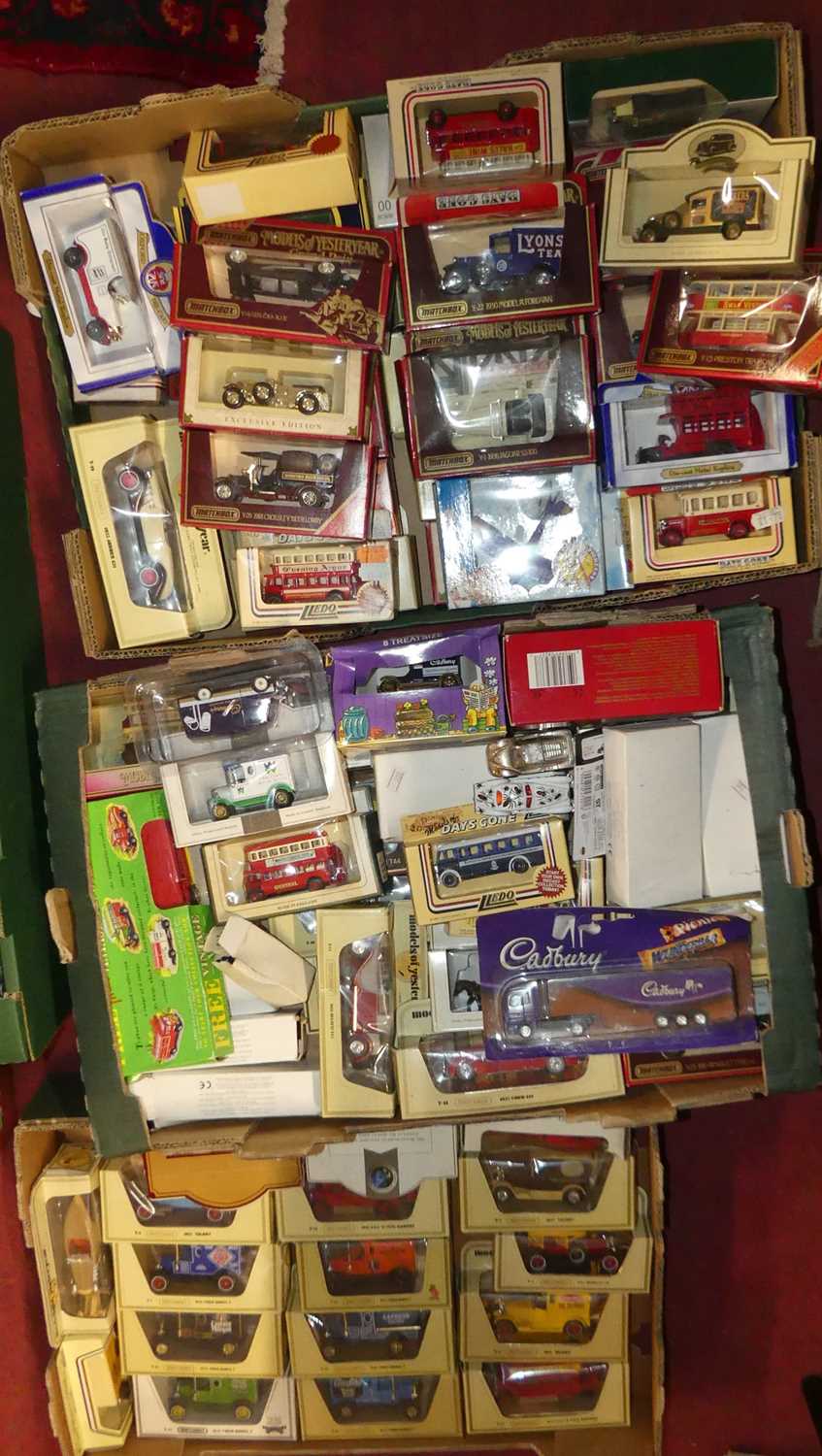 Three trays containing a collection of mixed modern issue diecast to include Matchbox Models of