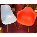 After Eames - a red polypropylene rocking chair, together with a further Eames style kitchen