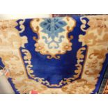 A small Chinese blue ground Superwash hall rug