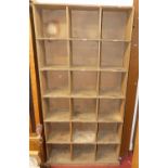 A softwood freestanding set of pigeon holes, with 18 open compartments, width 93cm