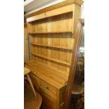 A contemporary pine kitchen dresser, width 150cm