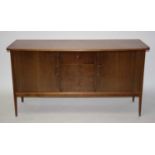 Peter Hayward for Vanson - a 1950s teak sideboard, having three central drawers, the upper drawer