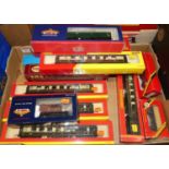 A box of mixed boxed Hornby Bachmann Airfix and similar 00 gauge rolling stock, to include Pullman