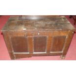 An antique joined oak three-panelled hinge top coffer, width 96cm