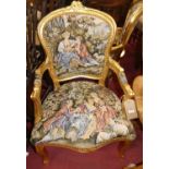 A pair of contemporary French gilt painted and needlework tapestry upholstered fauteuil, in the