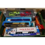 A box of modern issue diecast, to include a 1:64 scale Revel Racing truck and trailer gift sets,