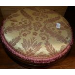 A Victorian mahogany upholstered top circular low foot stool, dia. 34cm