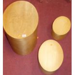 A graduated set of steamed & bent beechwood lidded oval boxes, the largest width 47cm