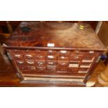A 19th century mahogany table top artist's chest, fitted with multiple divisional drawers (lacking