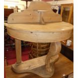 A rustic pine demi-lune ledgeback wash stand, width 90cm