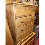 A rustic pine chest of four long drawers, width 64.5cmMissing drawer knob is in the drawer. Height