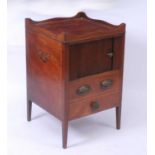 A George III mahogany tambour fronted night commode, having a full gallery top and tambour over a