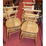 A set of six 1960s Ercol child's blond elm stacking chairs, each with twin bar backs, width 33cm