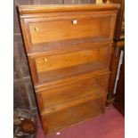 A 1930s Globe Wernicke oak four-tier stacking bookcase, width 86.5cm