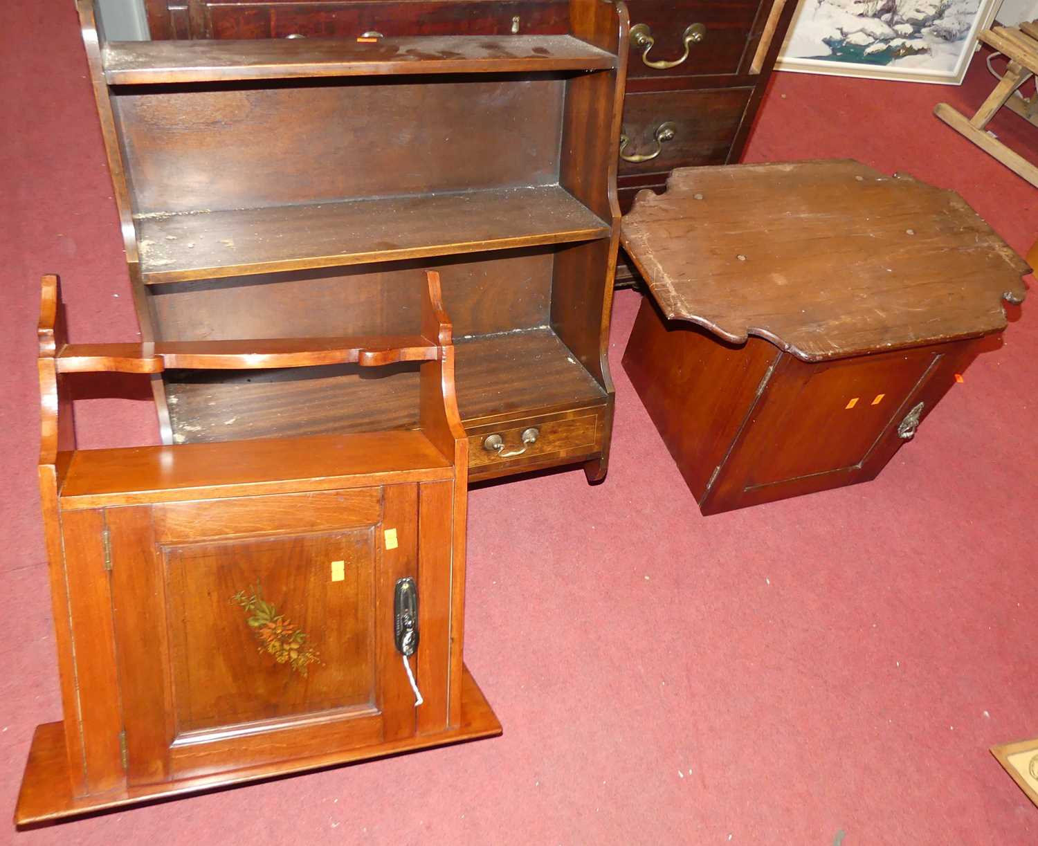 A mahogany three-tier waterfall open wall shelf, width 56cm, together with a further stained