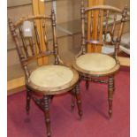 A pair of early 20th century turned beech pub chairs, together with stick back elbow chair,