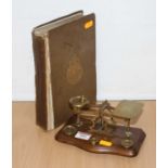 A set of brass postal scales; together with one volume being A History of Pottery & Porcelain,