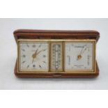 A vintage Looping 8-day travel clock, thermometer and barometer, 13cm